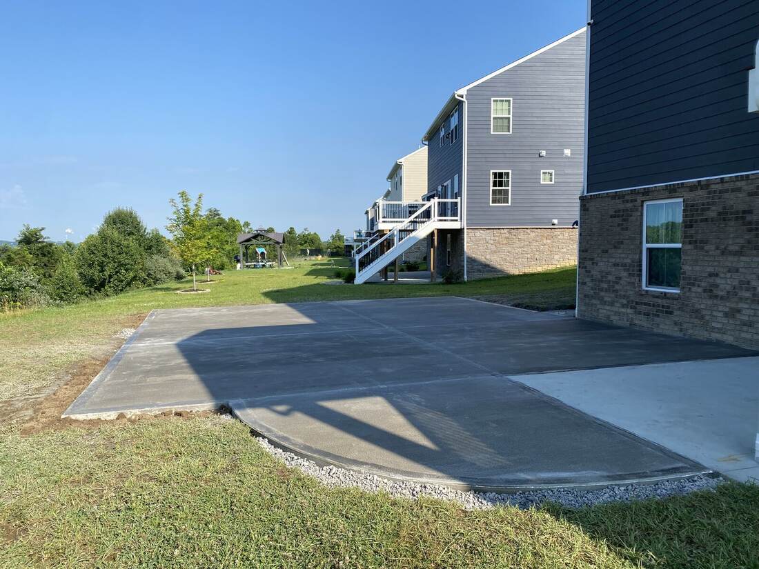 Backyard concrete patio pour